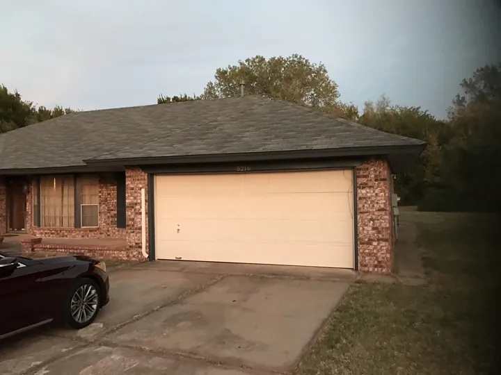 Brick home with a garage purchased by House Kings